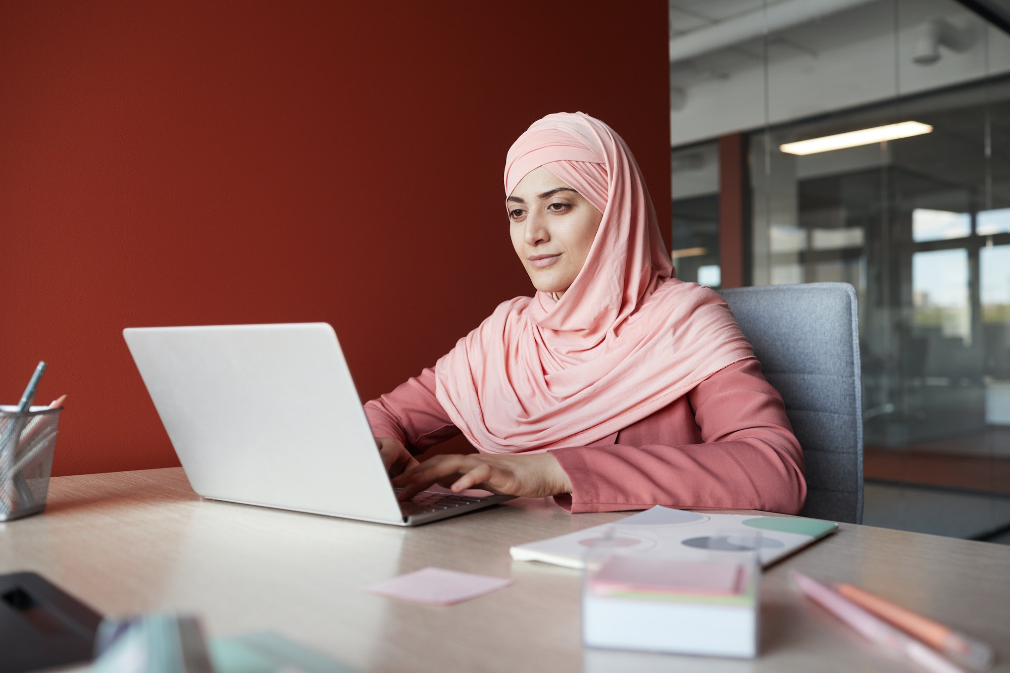 Muslim Businesswoman Working in Office